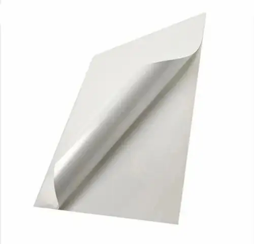 Waterproof PVC film self-adhesive label stock with its backing liner peeled back