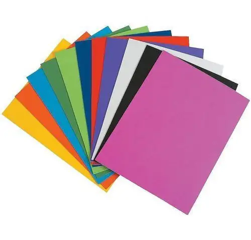 Coloured paper sheets fanned out in assorted shades