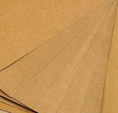 Fanned sheets of brown kraft paper