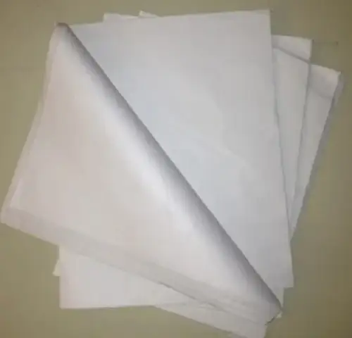 Folded sheets of lightweight white tissue paper