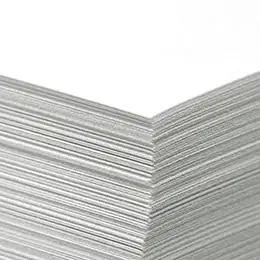 Stack of natural uncoated paper sheets